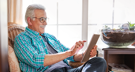 Older man using a tablet
