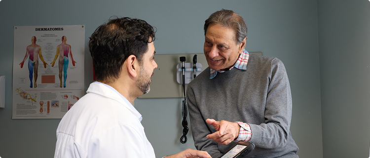 Man Getting Consultation from Doctor